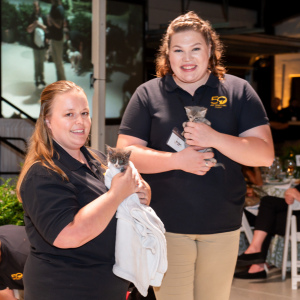 ARF\'s Jessica Quaresimo with Squirt and ARF\'s Bridget Stonemetz with Puddles. Photo by Mark Kopko Photography.