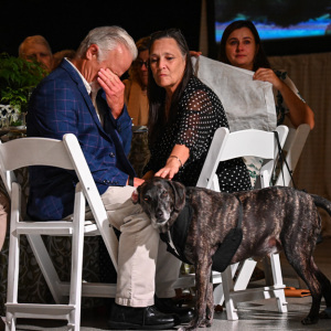 Brian Kwiatkowski gets emotional while watching the film featuring his adoption story of Sulu. Photo by Kristin L. Gray Photography.