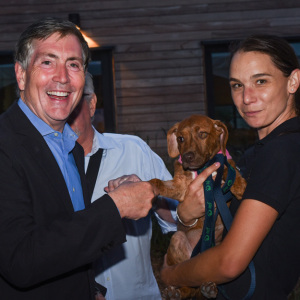 Bill McCuddy with Bon Bon and ARF\'s Veronica Grzybowska. Photo by Kristin L. Gray Photography.