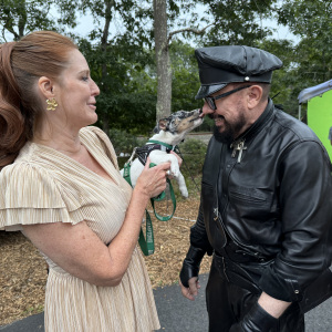 ARF\'s Kim Nichols with Ripley as he gives a kiss to Peter Marino. Photo by Durell Godfrey.