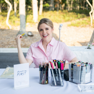 Everyone wanted to be sketched by artist Deanna First. Photo by Mark Kopko Photography.