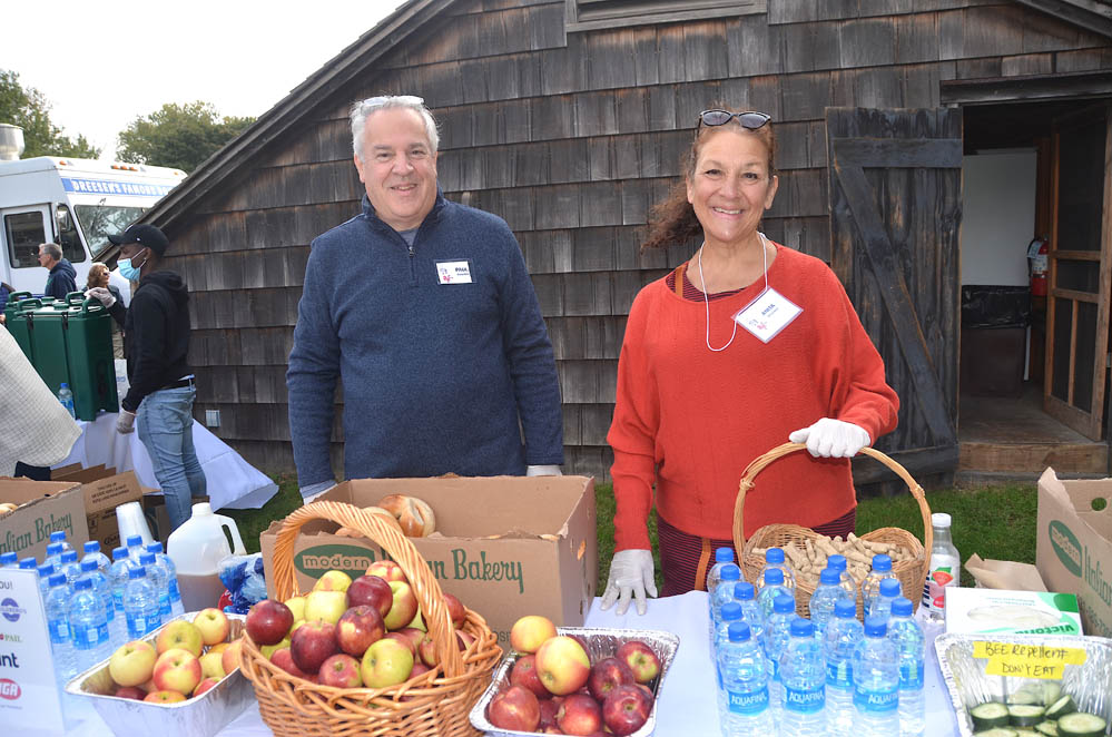 Volunteers Anita and Paul help at the food station. Thank you to Starbucks, Goldberg's and the Milk Pail for their donations!