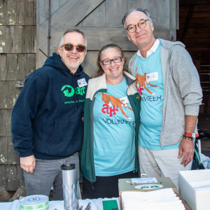 ARF volunteers Majo Prazenec, Heather Zwicker, and Tim O\'Conner work the Lucky Numbers Raffle Table. Photo by Lisa Tamburini.