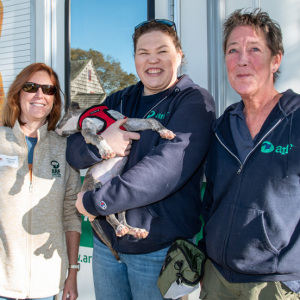 ARF\'s Kim Nichols. Bridget Stonemetz with puppy Dottie, and Debbie Downs. Photo by Lisa Tamburini.