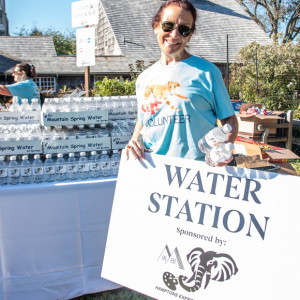 Hamptons Expert Painting - Dog Walk Water Sponsor with volunteer Anita Heiser. Photo by Lisa Tamburini.