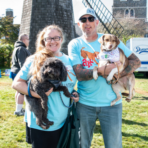 Volunteers Heather and John Zwicker and their pups. Photo by Lisa Tamburini.