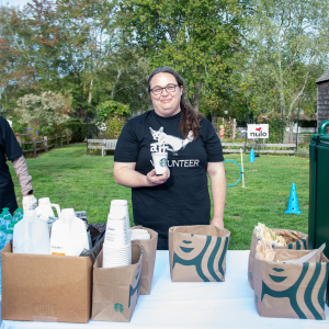 Jessica Claiborne from Starbucks generously donates coffee to caffeinate  the walkers. Photo by Lisa Tamburini. 