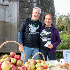Volunteers Paul and Anita Heiser at the food station. Photo by Lisa Tamburini.