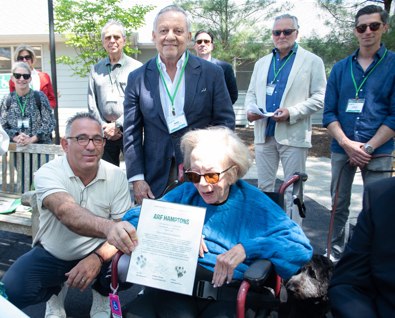 ARF board member Barbara Slifka get a proclamation for her decades of dedication to ARF.