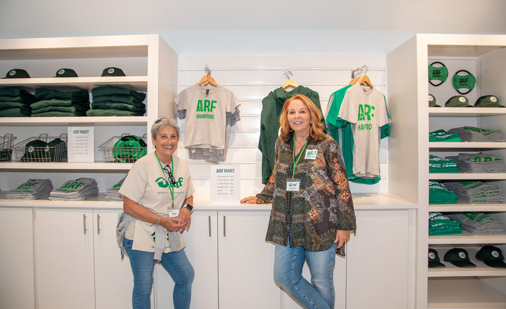 Volunteers Karin Barg and Pat Franzino help sell ARF swag at ARFmart.