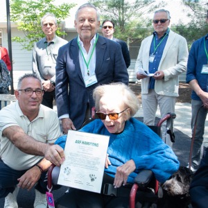 ARF board member Barbara Slifka get a proclamation for her decades of dedication to ARF.