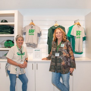 Volunteers Karin Barg and Pat Franzino help sell ARF swag at ARFmart.