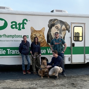 ARF's Debbie Down and Cindy LeRoy with Zeus , and Four Legged Fliers Charles Canavan and Jan Brentjens.
