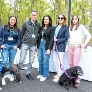 ARF's Melanie Marin with Cooper, ARF Board Members Zach Siegel, Danielle Pluthero, and Lisa McCarthy with Hudson and Maggie Saxena from sponsor Quintessentially..