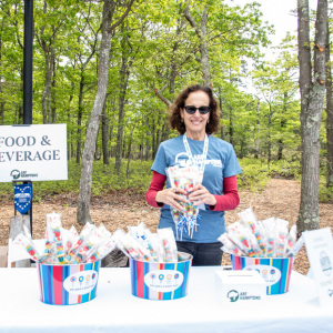 ARF volunteer Pattie Weinberg gives out sweet treats from Dylan's Candy Bar. Photo by Lisa Tamburini.