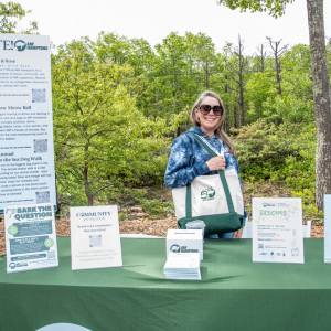 ARF volunteer Kimberly Dautenhahn mans the events table. Photo by Lisa Tamburini.